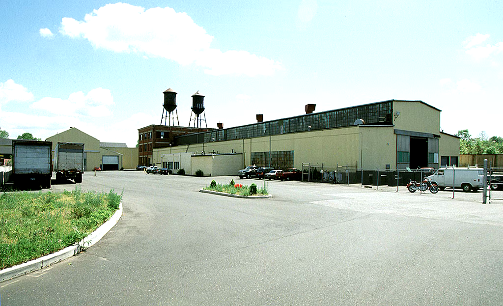 Industrial Complex Overview with Water Towers